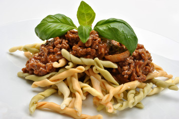 home made pasta with mince sauce and basil