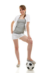 young woman clothed in sportswear with soccer ball