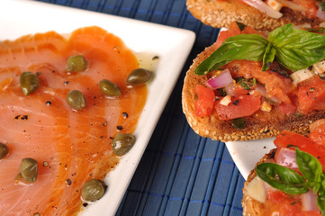 Italian appetizers, bruschetta and salmon