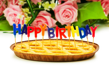 Happy birthday candles in the pie