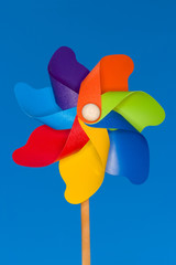 A stock Photograph of a colorful windmil toy.