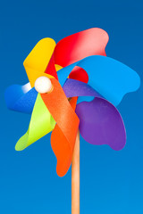 A stock Photograph of a colorful windmil toy.