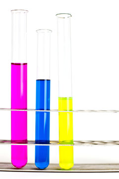 science concept - three test tubes with colorful substances in a