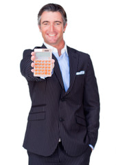 Attractive businessman holding a calculator