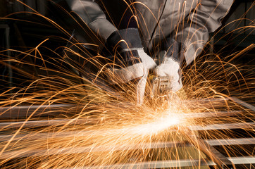 close up of a worker grinding