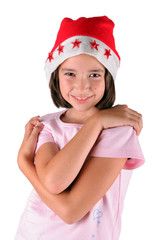Young smiled santa child in red hut
