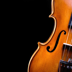 Naklejka premium vintage violin over dark background