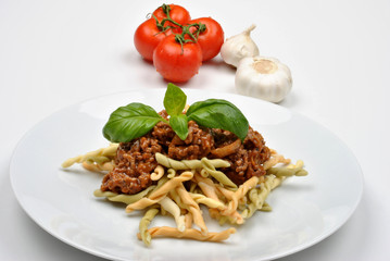 home made pasta with mince sauce and basil