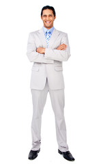Smiling businessman with folded arms