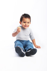 Happy toddler eating healthy