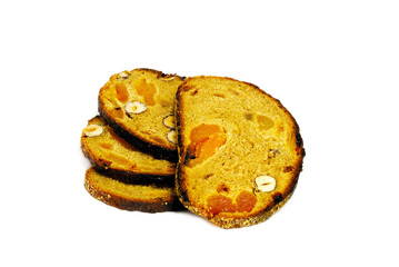 four loafs of bread with huzelnuts and halved apricots isolated