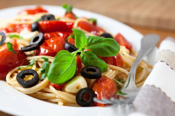 Spaghetti with cherry tomatoes and olives