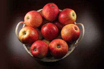 Fototapeta na wymiar Red apples in a basket
