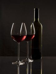 Two glasses red wine and one bottle - 19128616
