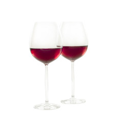 Two glassses red wine isolated on white