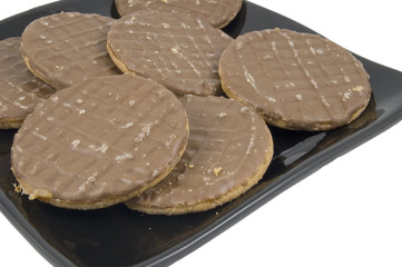 chocolate biscuits on tray isolated on white background