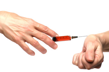 syringe on hand on white background