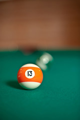 Billiard balls on green table - 19135692