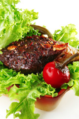 meat served on raw green salad