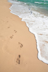 beach, wave and footsteps