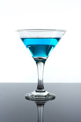 blue drink alcohol in a glass on the table