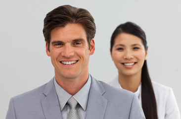 Multi-ethnic Business co-workers standing in a line