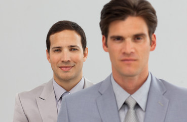 Serious Business partners standing in a line