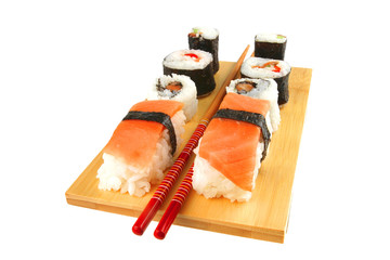 maki and sashimi sushi on plate