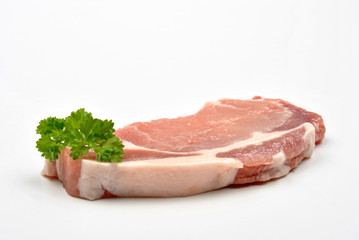 one raw organic pork chop and parsley