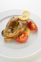 carp on organic potato and healthy vegetable