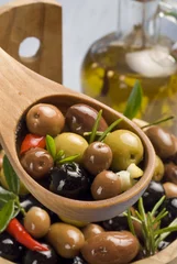Foto op Plexiglas Spanish tapas. Olives in a wooden spoon. © AgathaLemon