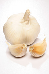 Heads of the garlic  on white