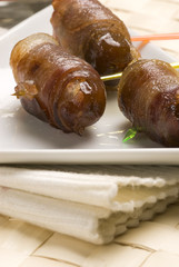 Spanish tapas. Date wrapped in bacon.