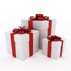 Beautiful white gift boxes with red ribbon isolated on white