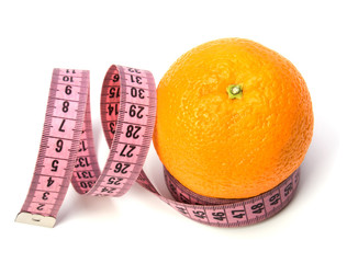 tape measure wrapped around the orange isolated on white backgr
