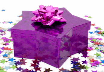 Star shaped gift box with a pink rosette