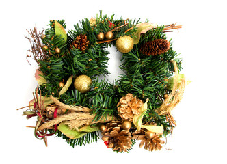 green christmas wreath over white background