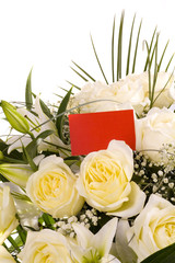 Bouquet of white flowers with a business card