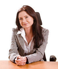 Young smiling woman at desk