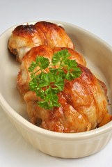 roasted delicious chicken olive in a white bowl