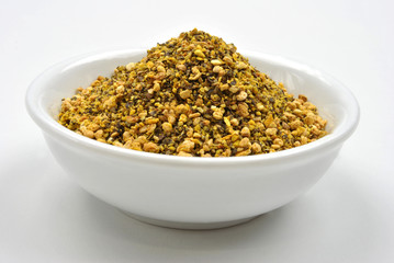 some organic lemon pepper in a white bowl