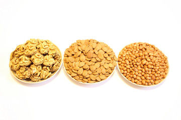 three plates with different nuts