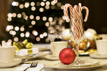 Candy canes and ornaments on table