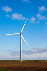 Fototapeta premium Modern energy generators in a field