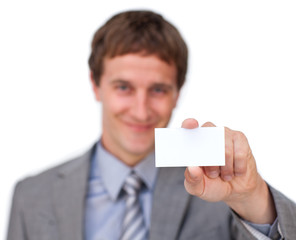 Blond businessman showing a white card