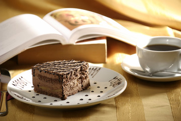 close up shot of a sliced cake and tea