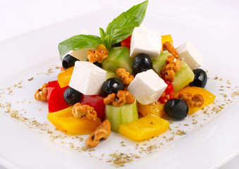 Fresh salad with vegetables and cheese