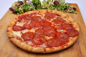 home made italian pizza with salami and cheese