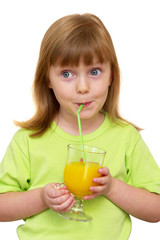 Young funny girl with a glass of juice