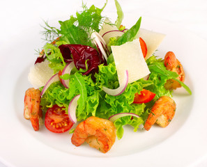 Fresh salad with vegetables and marine products